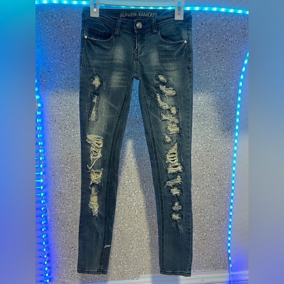 Almost Famous Blue Skinny Jeans with Fashionable Distressing - Picture 1 of 8
